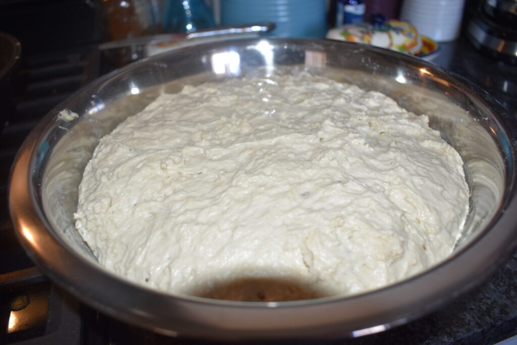 Risen sourdough in a bowl