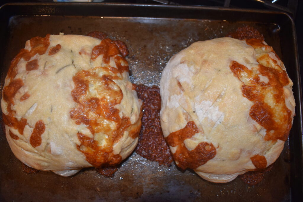 Rosemary cheese bread baked with crusty cheese on top