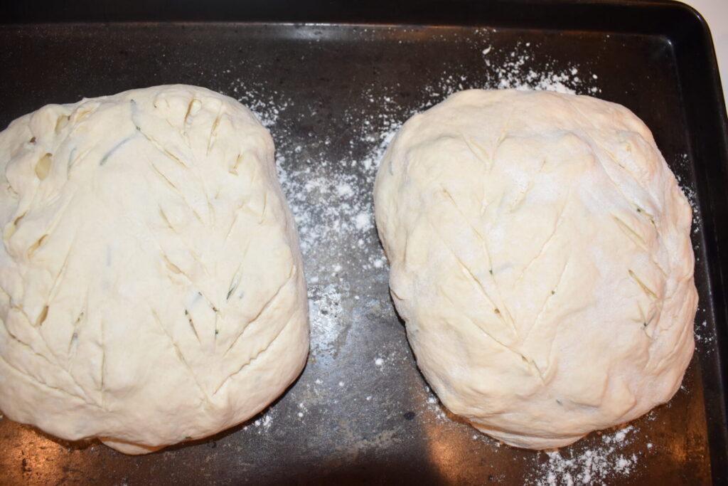 Rosemary cheese sourdough with cuts on top