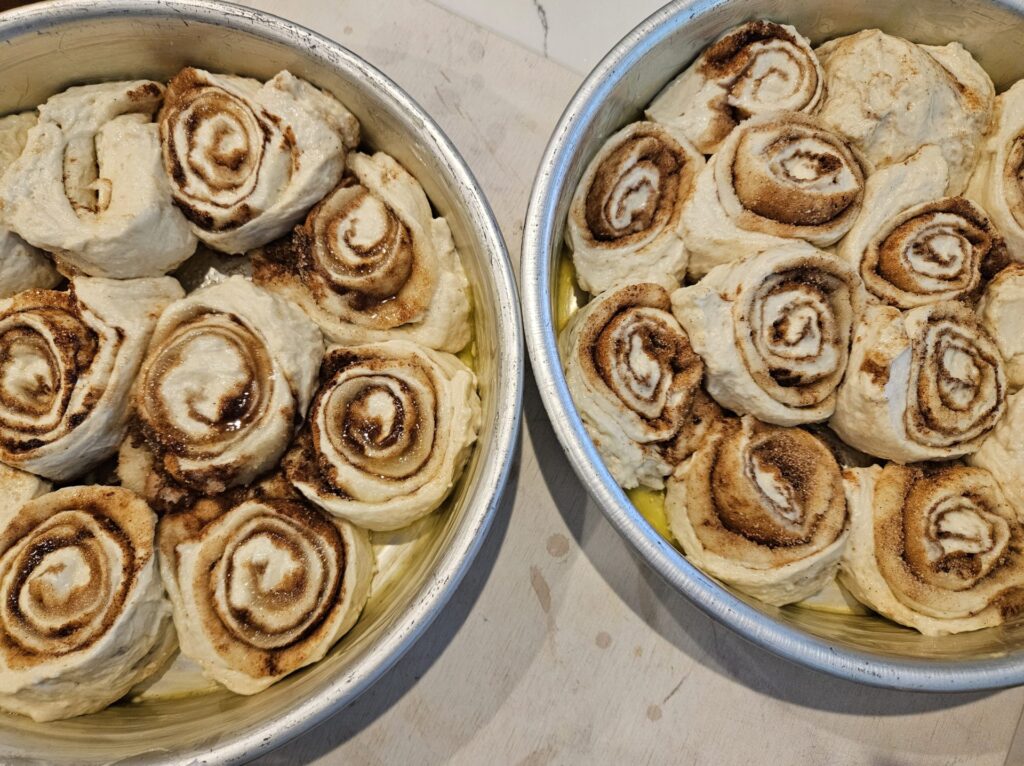 Sourdough cinnamon roll uncooked in a pan
